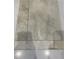 Close-up of tiled flooring with subtle textures and natural color variations at 54 Grove Township Way, Angier, NC 27501