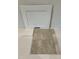 A selection of neutral-toned flooring options paired with a modern white cabinet door sample at 54 Grove Township Way, Angier, NC 27501