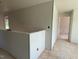 Hallway with open doorway, unfinished walls, and a blank canvas ready for customization at 54 Grove Township Way, Angier, NC 27501
