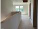 Hallway with windows, unfinished walls, and natural light, ready for transformation at 54 Grove Township Way, Angier, NC 27501