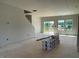 Bright living room with sliding glass doors leading to a deck, offering great natural light at 54 Grove Township Way, Angier, NC 27501