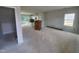 Spacious living room featuring an open floor plan and natural light at 54 Grove Township Way, Angier, NC 27501