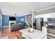 Inviting open-concept living space with fireplace and views of the staircase and kitchen at 5413 Botany Bay Dr, Raleigh, NC 27616