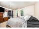 Cozy bedroom featuring a double bed, closet and natural light from two windows at 545 Billy Fitts Rd, Siler City, NC 27344