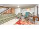 Cozy living room with decorative rug, stairway and furniture at 545 Billy Fitts Rd, Siler City, NC 27344