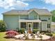 View of the backyard featuring an outdoor fire pit with seating and a covered patio at 5708 Butter Churn Way, Fuquay Varina, NC 27526