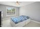 Bedroom with modern finishes, a ceiling fan, and great natural light at 5708 Butter Churn Way, Fuquay Varina, NC 27526