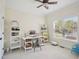 Bright and organized office space featuring a large window, desk, and ample storage shelving at 5708 Butter Churn Way, Fuquay Varina, NC 27526