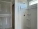 Bathroom featuring unfinished drywall with installed shower and tub, ready for customization and your personal touch at 59 Grove Township Way, Angier, NC 27501