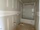 Bathroom featuring unfinished drywall with installed shower and tub ready for customization at 59 Grove Township Way, Angier, NC 27501