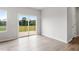 Bright dining area with sliding door access to a wooden deck at 59 Grove Township Way, Angier, NC 27501