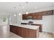 Elegant kitchen with a center island, stainless steel appliances, and open layout perfect for entertaining and cooking at 59 Grove Township Way, Angier, NC 27501