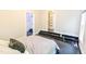 Bedroom view with built-in closet access and elevated floor at 6409 Lakeland Dr, Raleigh, NC 27612