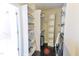 Walk-in closet featuring custom shelving and ample storage space at 6409 Lakeland Dr, Raleigh, NC 27612