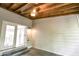 A cozy patio with wood ceiling, open to the outdoors, and seamless indoor-outdoor living at 6409 Lakeland Dr, Raleigh, NC 27612