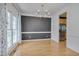 Formal dining room with hardwood floors, chandelier, and view of the kitchen at 709 Basil Dr, Durham, NC 27713