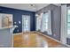 Open floorplan view of the dining area and kitchen with hardwood floors at 709 Basil Dr, Durham, NC 27713