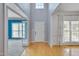 Bright foyer with hardwood floors and a view of the dining and living areas at 709 Basil Dr, Durham, NC 27713