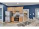 Well-equipped kitchen with stainless steel appliances and ample countertop space at 709 Basil Dr, Durham, NC 27713