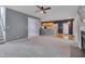 Bright living area with fireplace, open to kitchen, and hardwood floors at 709 Basil Dr, Durham, NC 27713