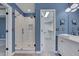 Beautiful main bathroom showcases glass shower, subway tile, modern sink, and fixtures at 709 Basil Dr, Durham, NC 27713