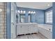 Modern main bathroom with dual vanity, tub, and subway tile at 709 Basil Dr, Durham, NC 27713