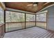 Screened porch with wood ceiling, ceiling fan and view of the backyard at 709 Basil Dr, Durham, NC 27713