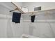 A neutral closet with several hanging items at 7218 Sunrise Rd, Chapel Hill, NC 27514