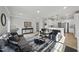 Inviting living room with modern decor, open to the kitchen at 7218 Sunrise Rd, Chapel Hill, NC 27514
