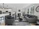 Spacious living room featuring a fireplace, stylish seating, and an open layout at 7218 Sunrise Rd, Chapel Hill, NC 27514
