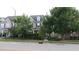 Attractive townhome featuring well-maintained landscaping and a charming exterior at 742 Keystone Park Dr, Morrisville, NC 27560