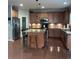 Spacious kitchen with a large island, stainless steel appliances, and ample cabinet space at 742 Keystone Park Dr, Morrisville, NC 27560