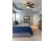 Spacious main bedroom with tray ceilings and rustic decor at 742 Keystone Park Dr, Morrisville, NC 27560
