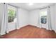 Bedroom with windows, natural light and neutral walls at 7433 Deer Track Dr, Raleigh, NC 27613