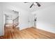 Bright living room boasts hardwood floors and neutral wall color at 7433 Deer Track Dr, Raleigh, NC 27613