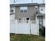 Exterior shot of a fenced in backyard with a patio at 8013 River Water Ct, Raleigh, NC 27616