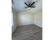 Spacious bedroom featuring modern ceiling fan and new floors at 8013 River Water Ct, Raleigh, NC 27616