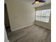 Bedroom featuring ceiling fan and hardwood flooring at 8013 River Water Ct, Raleigh, NC 27616