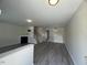 Spacious living room with fireplace and staircase at 8013 River Water Ct, Raleigh, NC 27616