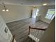 Bright and spacious living area features hardwood flooring and plenty of natural light at 8013 River Water Ct, Raleigh, NC 27616
