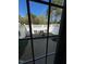 View of the enclosed backyard patio with table and chairs, ideal for outdoor relaxation at 8013 River Water Ct, Raleigh, NC 27616