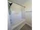 Clean shower with an adjustable showerhead at 8013 River Water Ct, Raleigh, NC 27616