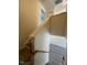 View of the staircase featuring wooden handrails and stairs leading to the upper level at 8013 River Water Ct, Raleigh, NC 27616