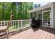Spacious back deck with seating area and a grill, perfect for outdoor entertaining and overlooking the yard at 8480 Falkirk Ridge Ct, Wake Forest, NC 27587
