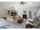 Cozy living room featuring a fireplace, skylights, and a large entertainment center at 8480 Falkirk Ridge Ct, Wake Forest, NC 27587