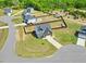 Aerial view of a home on a large lot with a fenced backyard and cul-de-sac at 85 Sun Mdw Cir, Benson, NC 27504