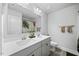 Modern bathroom with double sinks, a large mirror, and stylish decor, providing a luxurious and functional space at 85 Sun Mdw Cir, Benson, NC 27504