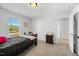 Serene bedroom with neutral walls, wood furniture, and plenty of light, offering a comfortable and relaxing atmosphere at 85 Sun Mdw Cir, Benson, NC 27504