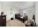 Elegantly decorated bedroom with neutral colors, wooden accents, and ample natural light, creating a peaceful and refined space at 85 Sun Mdw Cir, Benson, NC 27504