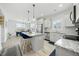 Beautiful, updated kitchen features stainless steel appliances, granite counters, and a spacious island at 85 Sun Mdw Cir, Benson, NC 27504